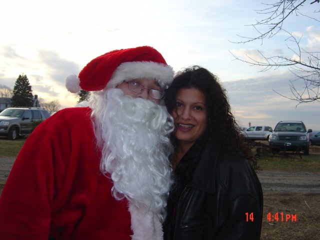 Santa Take time for a photo with Dennis DiFranco's Wife Yasmin DiFranco